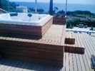 La Compagnie Tropicale, spécialiste de Terrasse et habillage d'un jacuzzi en Teck Birman (Cassis)
